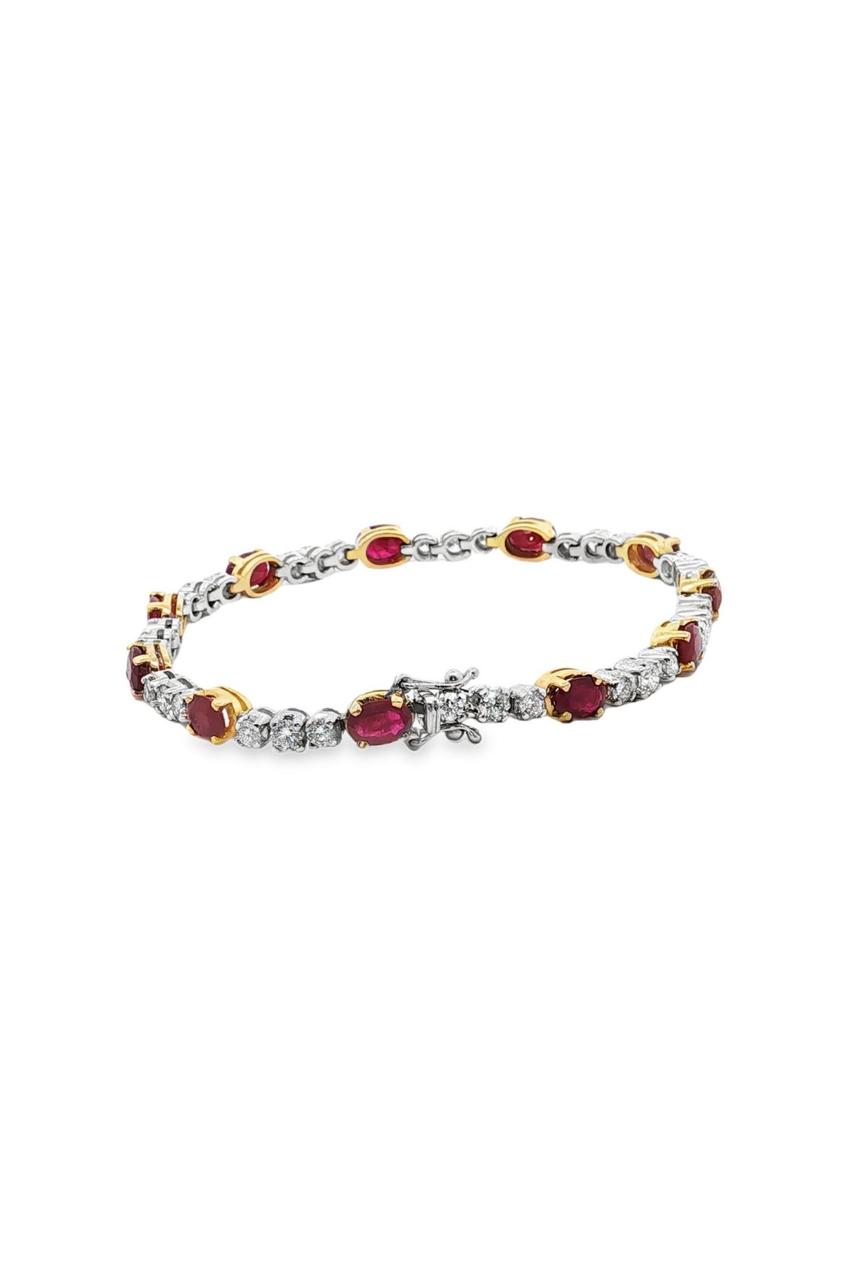 Oval Ruby Alternating Tennis Bracelet in White Gold
